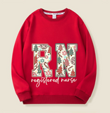 RN Christmas-themed printed sweatshirt